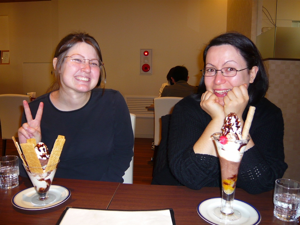 p1000129.jpg - Oh look, we're back at the awesome parfait place in Sanjo, and Katie J. and Elisa look happy about their parfaits!