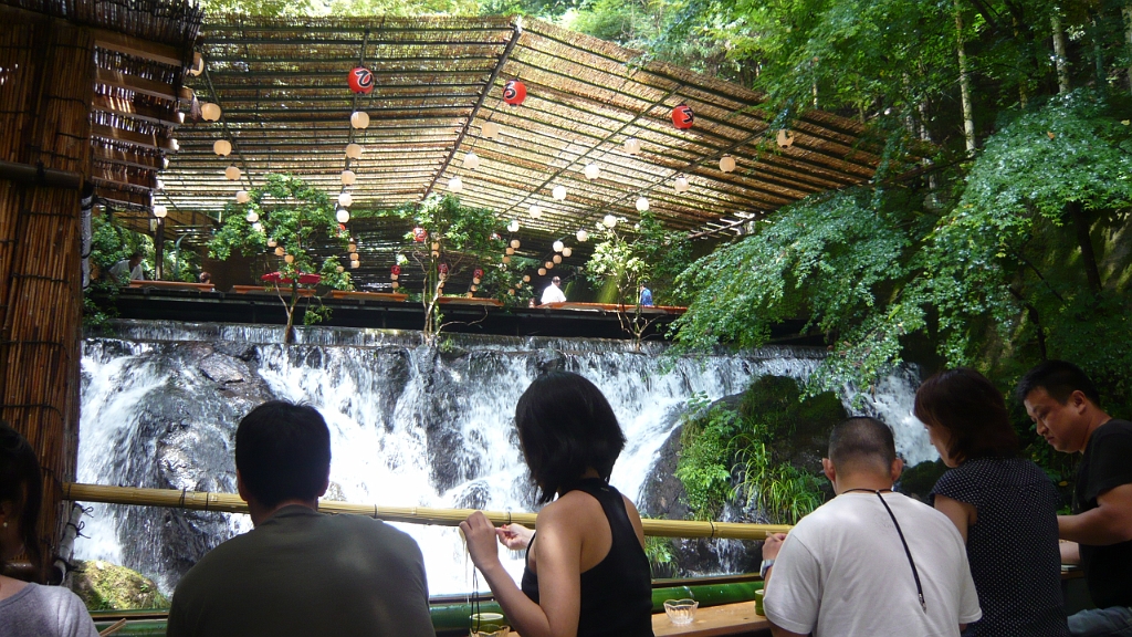 P1020820.JPG - The restaurant was constructed on mats hovering above a river, and then the noodles flowed out in a pipeline (not in river water!)  in clumps and you grabbed them out with chopsticks.