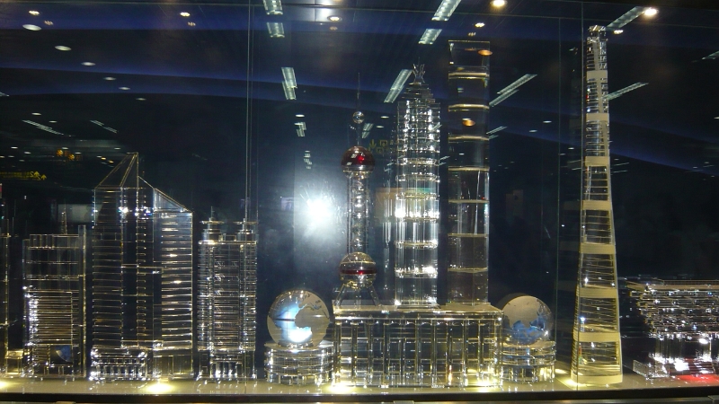 P1030300.JPG - Here you can more clearly see the glass reconstructed Shanghai skyline.  This was in a subway station near the skyscraper district.