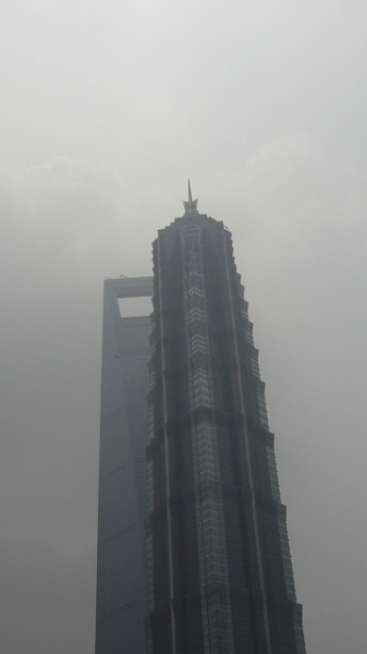 P1030302.JPG - Instead, we went to the Shanghai World Financial Center, which is the one in the background that looks like a bottle opener.  This was actually a fairly "sunny day," and the clouds are due more to smog. :-\