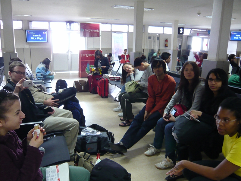 p1020099.jpg - Something like 11 hours after arriving in Delhi, our group is finally through security waiting for our flight to Hyderabad.  (We had missed our original connection because our flight from Beijing was delayed.)