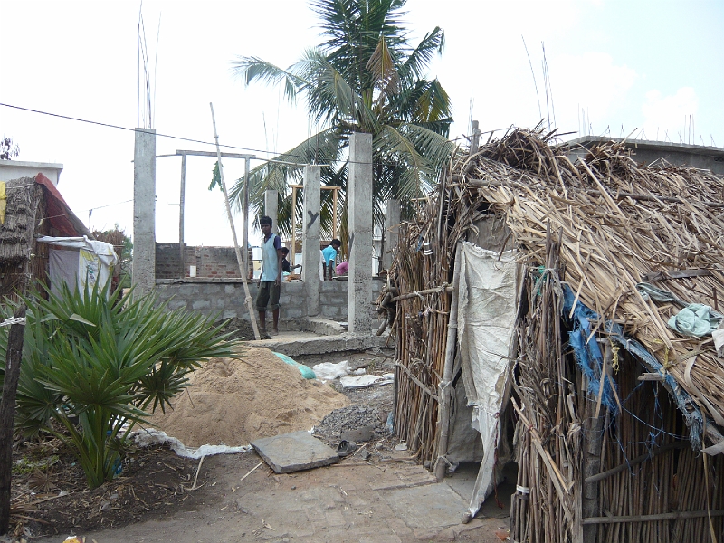 p1020144.jpg - In the background is one of the houses we were helping to build.