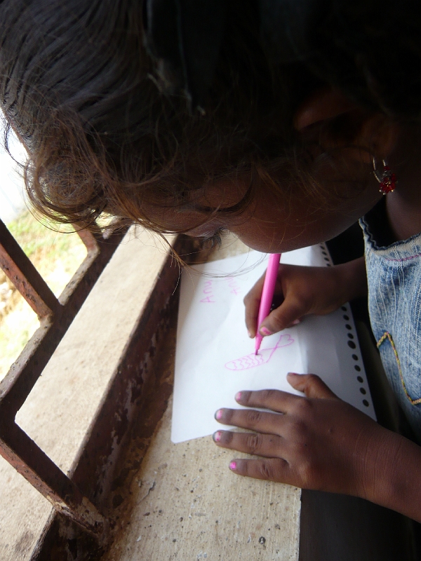 p1020190.jpg - Anu, the girl who became my particular friend, took some special encouragement before she would try writing, but she finally decided to give it a go.