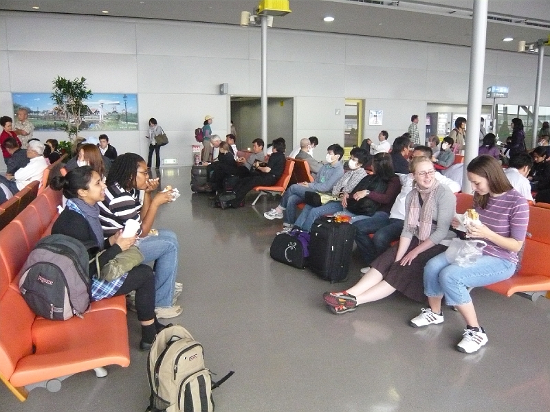 p1020298.jpg - We got a sense of déjà vu meeting at Kansai International Airport, since the gate looked the same as our trip to India less than two months earlier, and the group was mostly the same too.  Linda (blonde hair, second from right) was the only member of our group not to have gone on that trip.