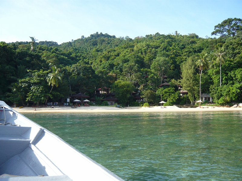 p1020432.jpg - Anna and I approach our island resort on Pulau Perhentian Kecil, hidden in the jungle.